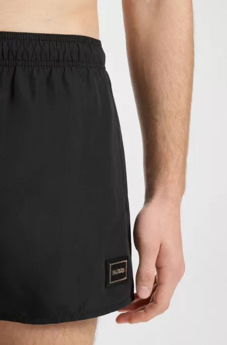 Logo-cord swim shorts with metal logo