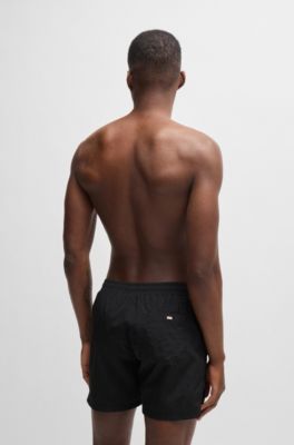 Ba&ntilde;ador con logo estampado metalizado y raya, Negro