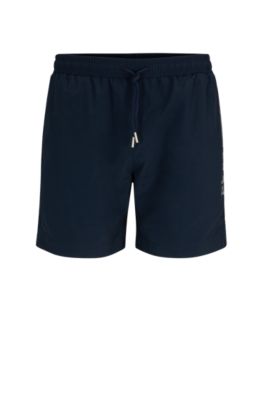 Shop Hugo Boss Quick-drying Swim Shorts With Metallic Logo In Dark Blue
