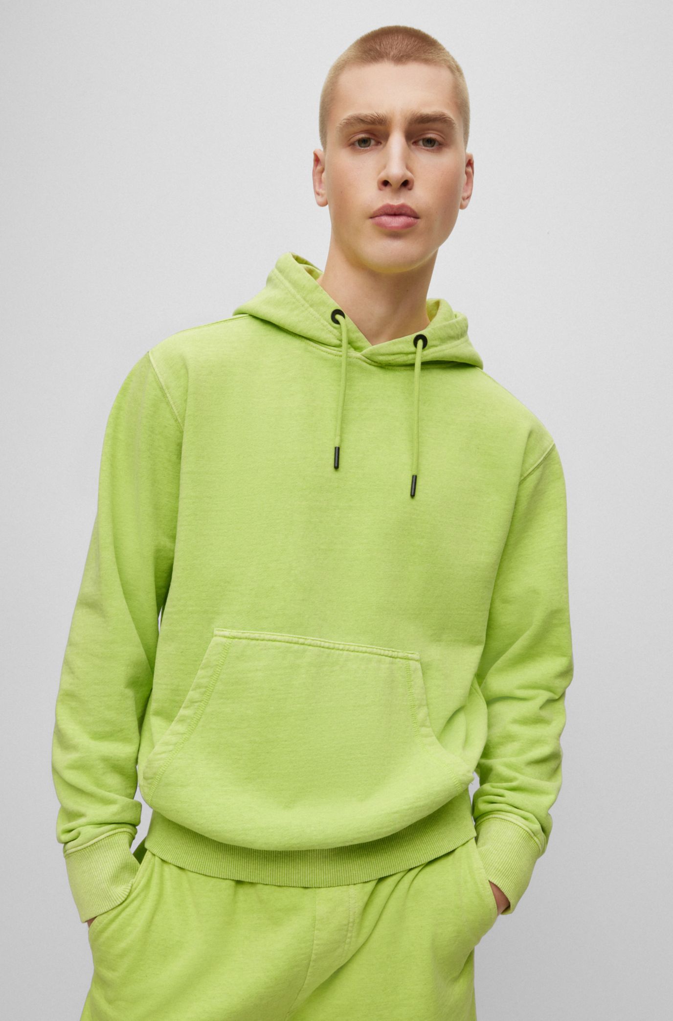 - Cotton-blend relaxed-fit hoodie with logo