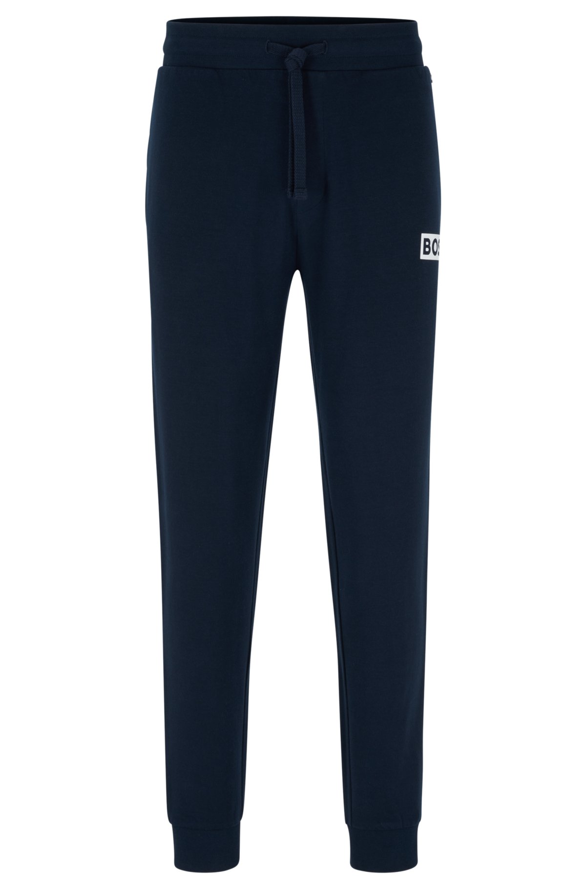 Cuffed tracksuit bottoms in French terry with logo print