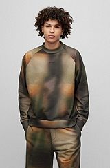 Cotton-terry sweatshirt with bleach-effect camouflage print, Patterned