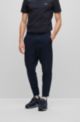 Tapered-fit trousers in lightweight water-repellent stretch poplin, Dark Blue