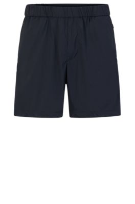 Shop Hugo Boss Slim-fit Shorts In Water-repellent Stretch Fabric In Dark Blue