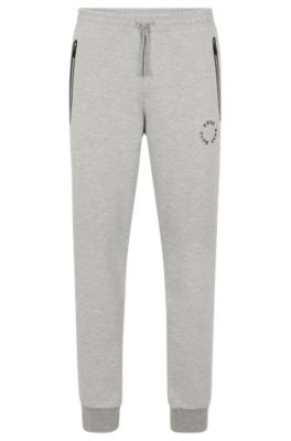 Cotton-blend tracksuit bottoms with rhinestone trims