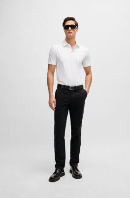 Chinos slim fit en tejido de gabardina de algod&oacute;n el&aacute;stico, Negro