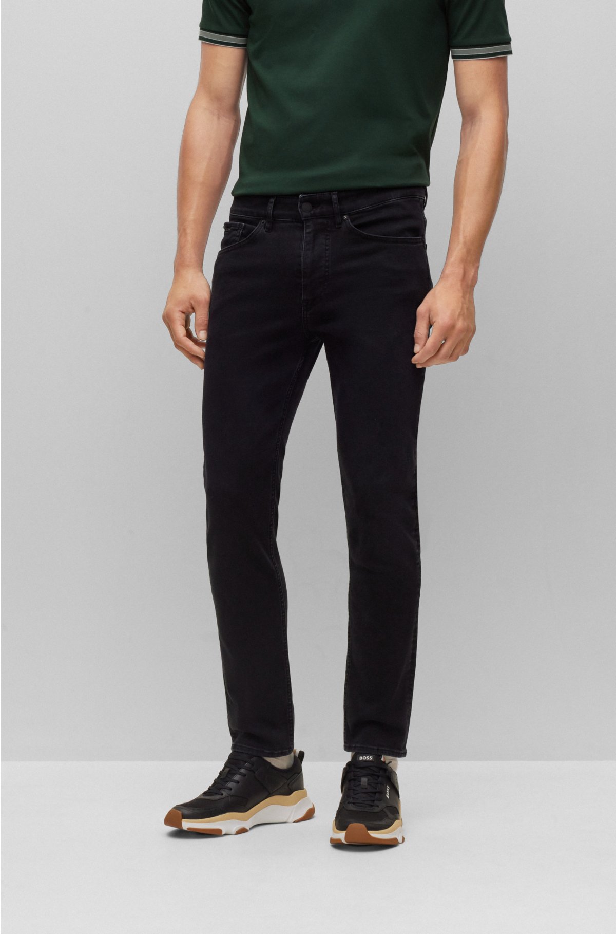 BOSS - Tapered-fit jeans in supreme-movement