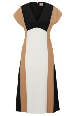 How Colorblock Dresses Slim & Shape Your Body  Stretch knit dress, Colorblock  dress, Fashion dresses