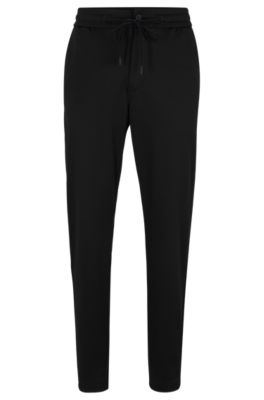 BOSS - Tapered-fit tracksuit bottoms in stretch jersey