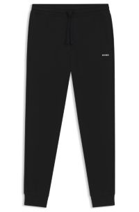 HUGO - Cotton-terry tracksuit bottoms with logo print