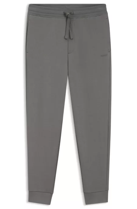 Cuffed sweatpants in cotton terry with logo print