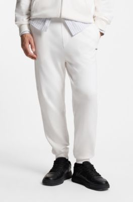 Pantalones casuales de algod&oacute;n con pu&ntilde;os el&aacute;sticos, Blanco