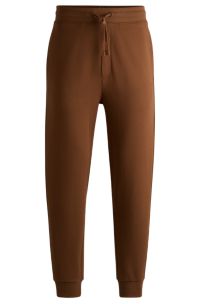 HUGO - Cotton-terry tracksuit bottoms with logo print