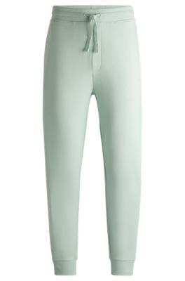 Hugo Boss Cotton-terry Tracksuit Bottoms With Logo Print In Light Green