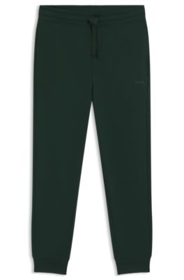 Bas de surv&ecirc;tement en molleton de coton avec logo imprim&eacute; et bas de jambes resserr&eacute;s, Chaux