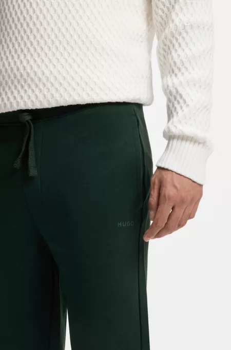 Cuffed sweatpants in cotton terry with logo print