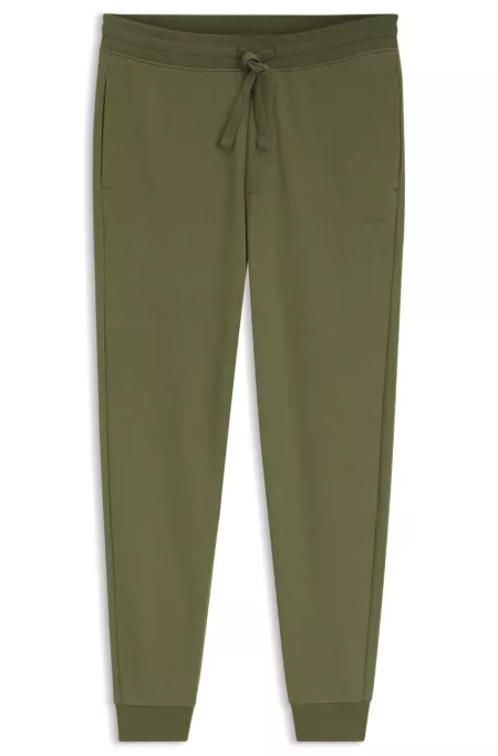 Cotton casual pants with elasticized cuffs