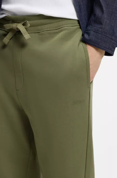 Cotton casual pants with elasticized cuffs