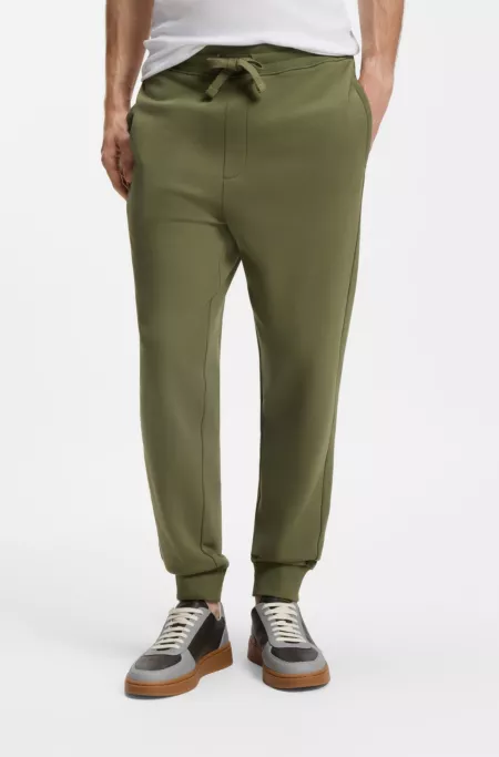 Cotton casual pants with elasticized cuffs