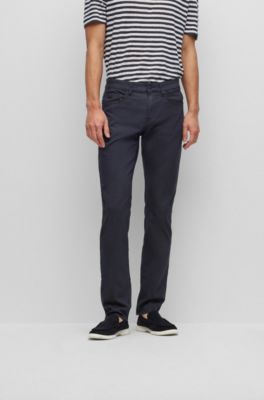 HUGO - Denim regular-fit jeans with stacked-logo jacquard