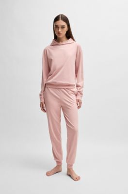 Cuffed tracksuit bottoms with logo print, light pink