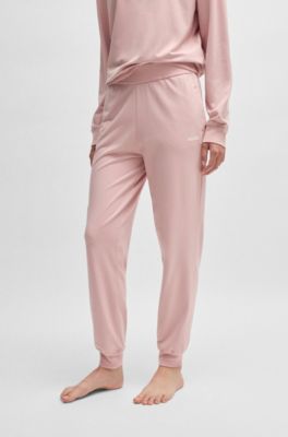 Cuffed tracksuit bottoms with logo print, light pink