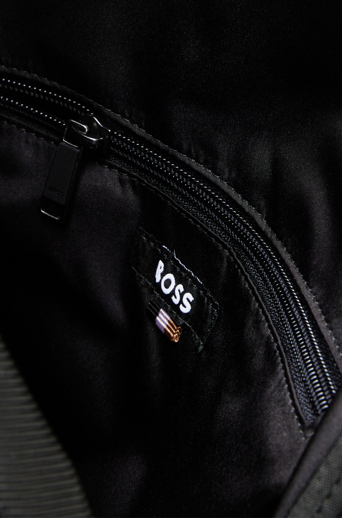 BOSS - Flap-closure backpack in recycled fabric with logo patch