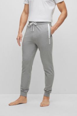 Shop Hugo Boss Cotton-terry Tracksuit Bottoms With Stripe And Logo In Grey