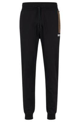 BOSS Cotton terry tracksuit bottoms with logo and stripe prints