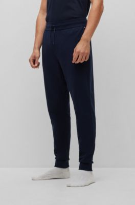 Hugo Boss Cotton-terry Loungewear Tracksuit Bottoms With Embossed Logo In Dark Blue