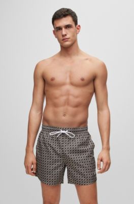 Hugo Boss Logo Swim Shorts With All-over Seasonal Pattern In Beige