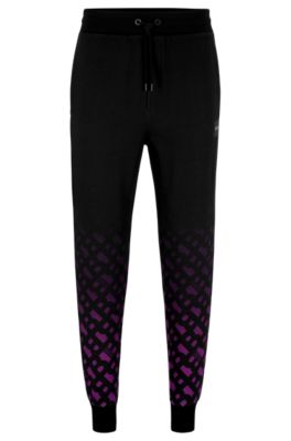 Hugo Boss Boss X Khaby Relaxed-fit Cotton-blend Tracksuit Bottoms With Gradient Monograms In Dark Purple