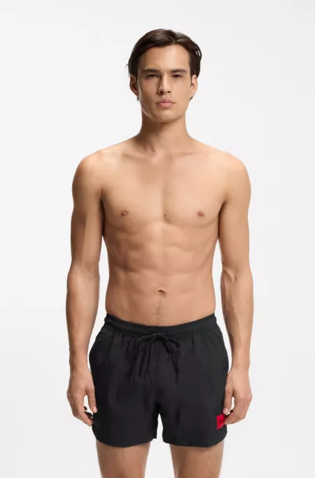 Quick-drying swim shorts in recycled material with logo