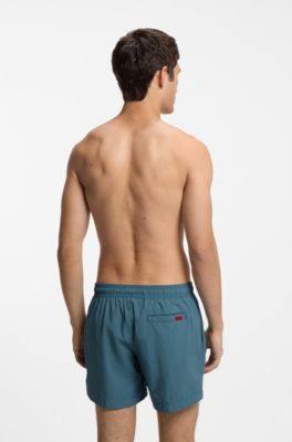 Quick-drying swim shorts in recycled material with logo, Turquoise