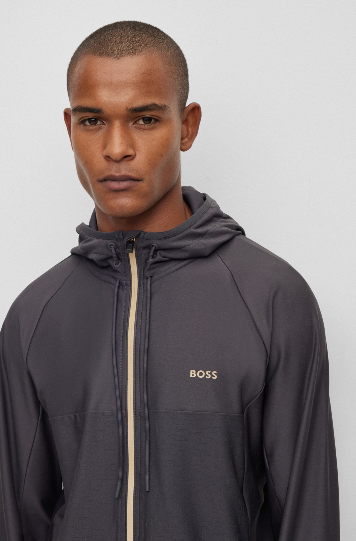 BOSS - Active-stretch zip-up hoodie with decorative reflective pattern