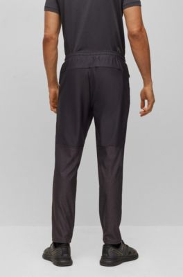 dark grey adidas tracksuit bottoms