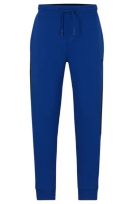 Shop Hugo Boss Cotton-blend Tracksuit Bottoms With Side-stripe Tape In Blue