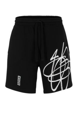 Shop Hugo Relaxed-fit Cotton Shorts With Graffiti-inspired Logo In Black