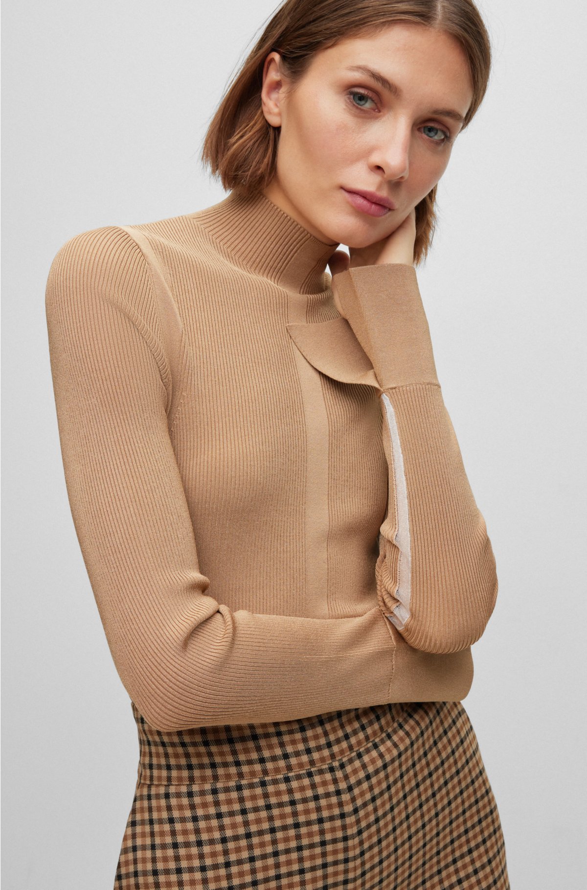 High-neck sweater in a ribbed knit