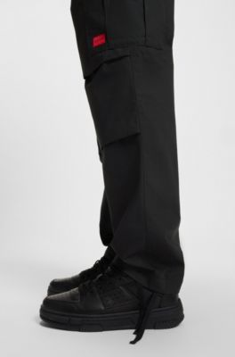 Pantalones cargo slim fit en algod&oacute;n antidesgarros, Negro