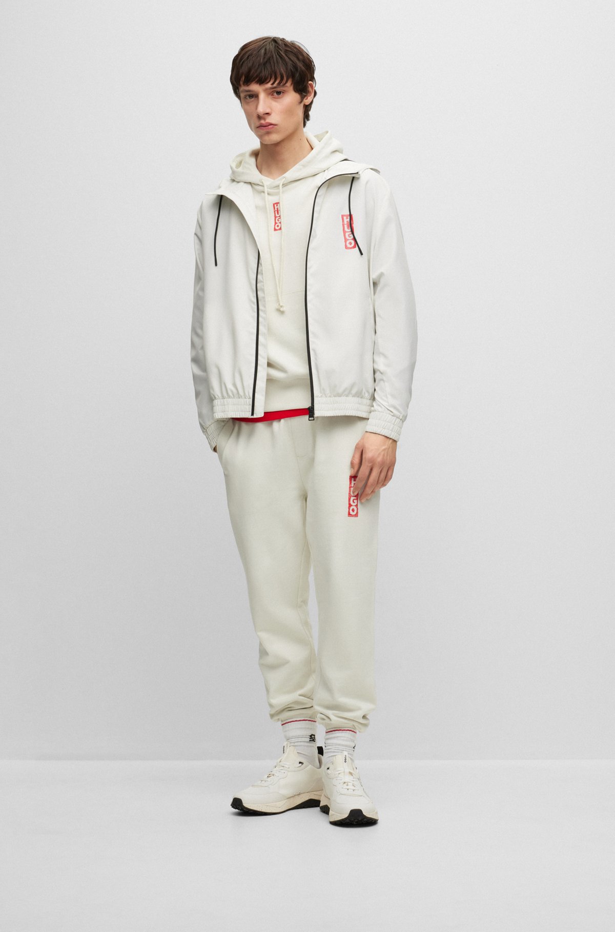 HUGO - Cotton-terry tracksuit bottoms with vertical logo