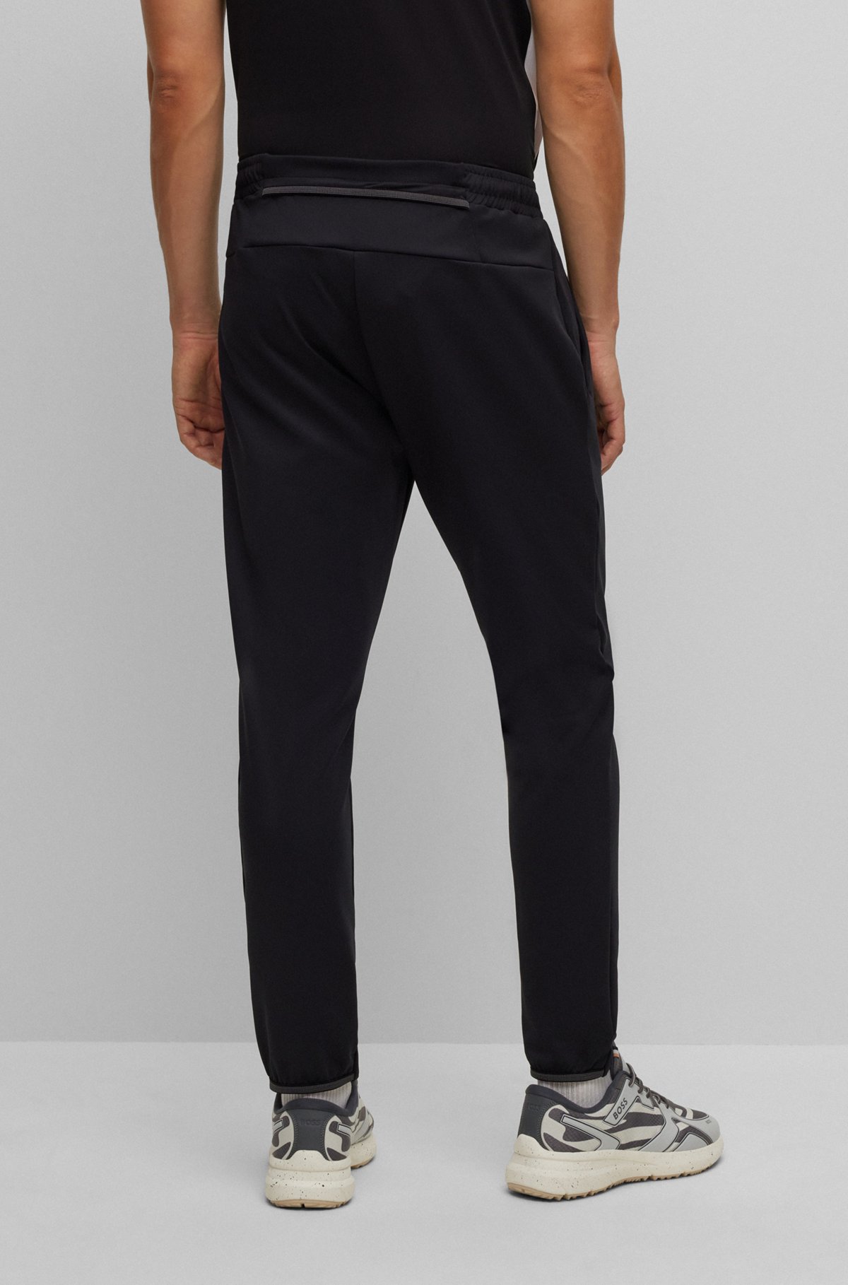 BOSS - Cuffed tracksuit bottoms in active-stretch fabric - Black BOSS - Cuffed tracksuit bottoms in active-stretch fabric - Black