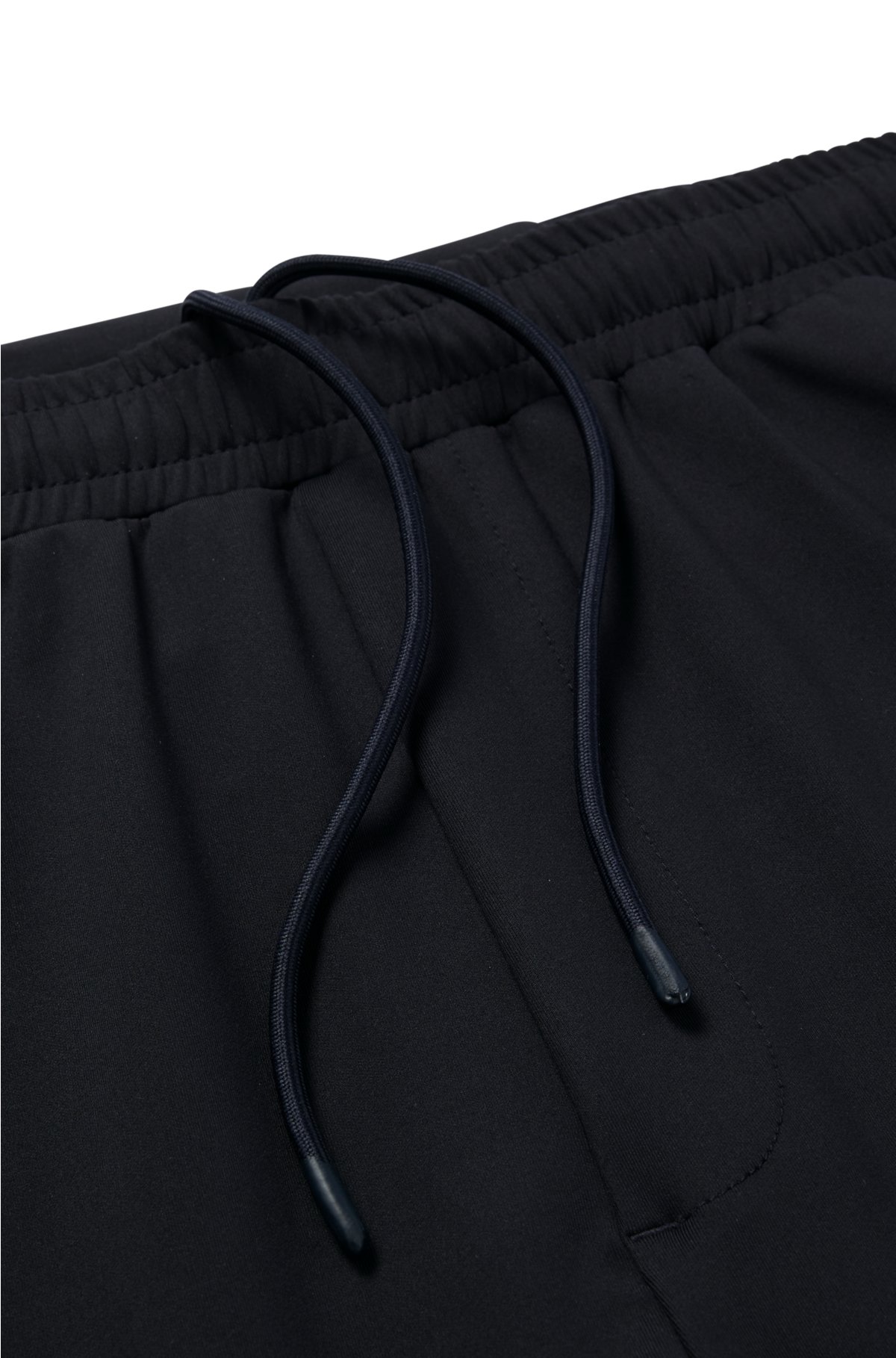 Pantalones de chándal con bajos ceñidos y cordón de ajuste