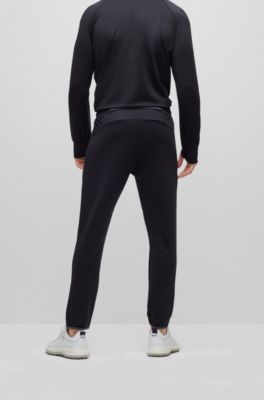 BOSS - Cuffed tracksuit bottoms in active-stretch fabric