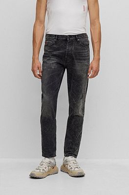 HUGO - Tapered-fit jeans in black rigid denim