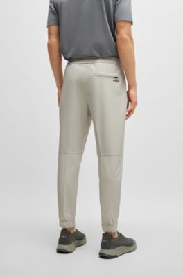 Chinos tapered fit en tejido multiel&aacute;stico de planchado f&aacute;cil, Beige claro