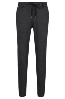 BOSS - Regular-fit trousers in macro-printed stretch jersey