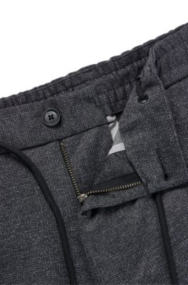 BOSS - Regular-fit trousers in macro-printed stretch jersey