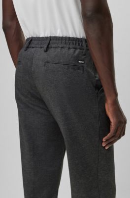 BOSS - Regular-fit trousers in macro-printed stretch jersey