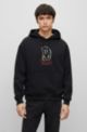 Relaxed-fit cotton hoodie with doodle motifs, Black